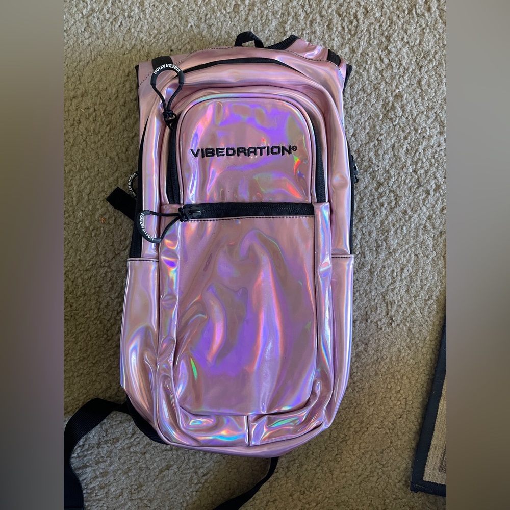 Holographic pink Vibedration hydration pack